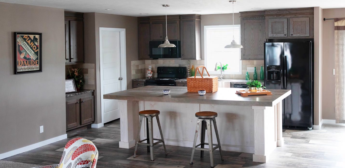 Kitchen in a manufactured home with a laminate island and counters