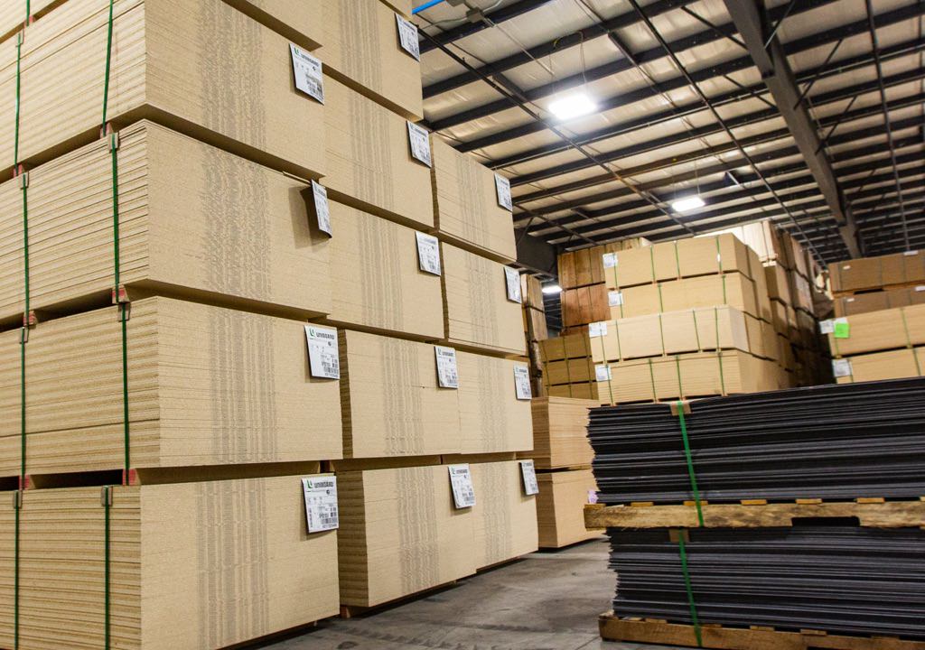 Stacks of panel supplies in the Genesis Products warehouse
