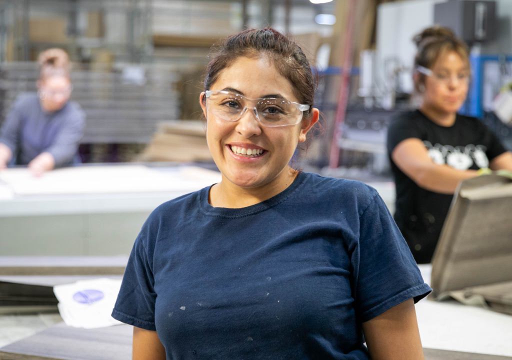 women working in Genesis factory
